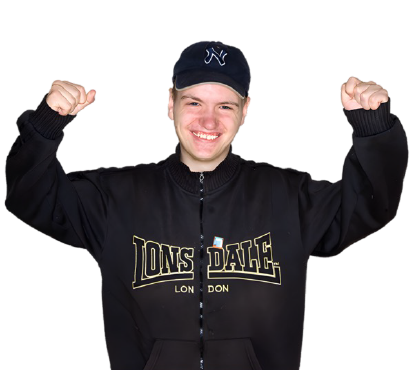 A happy boy showing his strength with both arms.