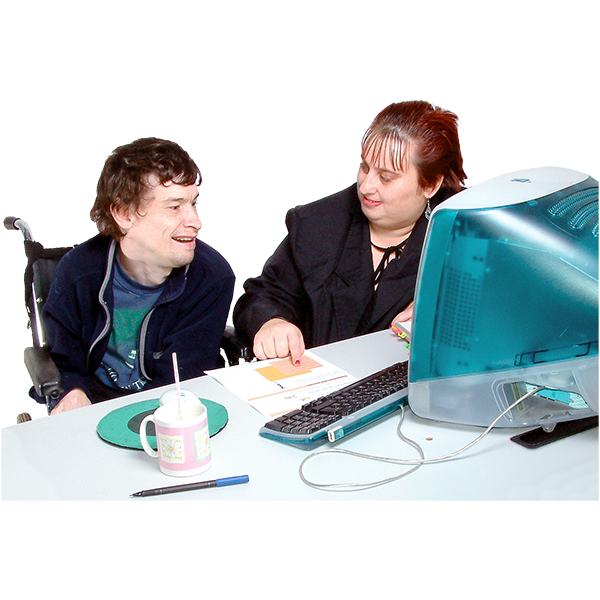 Two people sitting in front of a computer