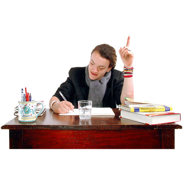 A woman sitting on a desk with her hand pointing up