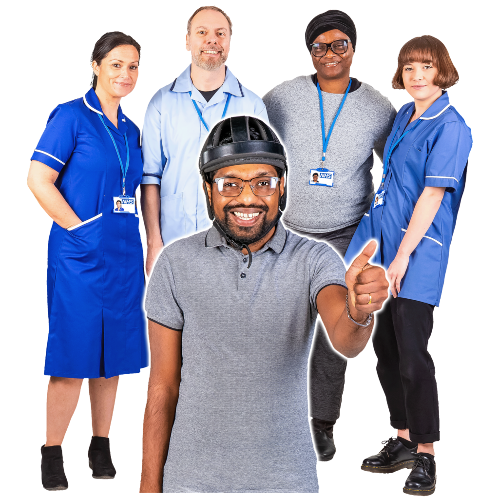 A group of healthcare professionals and a man giving a thumbs-up.