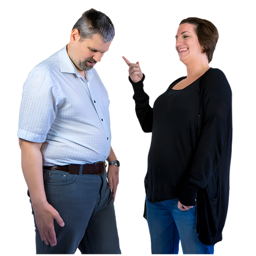 A woman pointing and laughing at a man who is looking down.