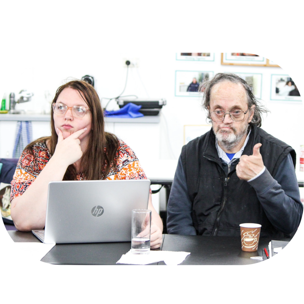A woman sitting next to a man. 