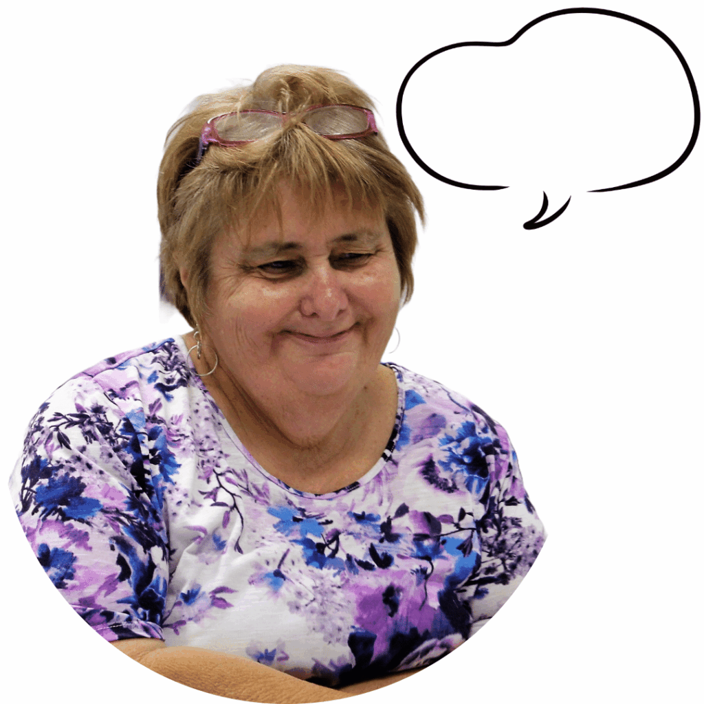 A woman smiling while thinking.