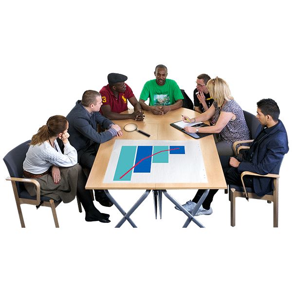 A group of people sitting in a big table 
