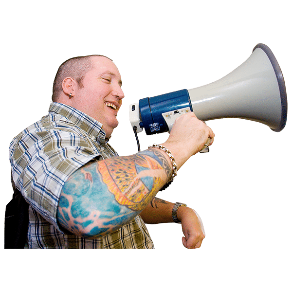 A man holding and speaking to a megaphone